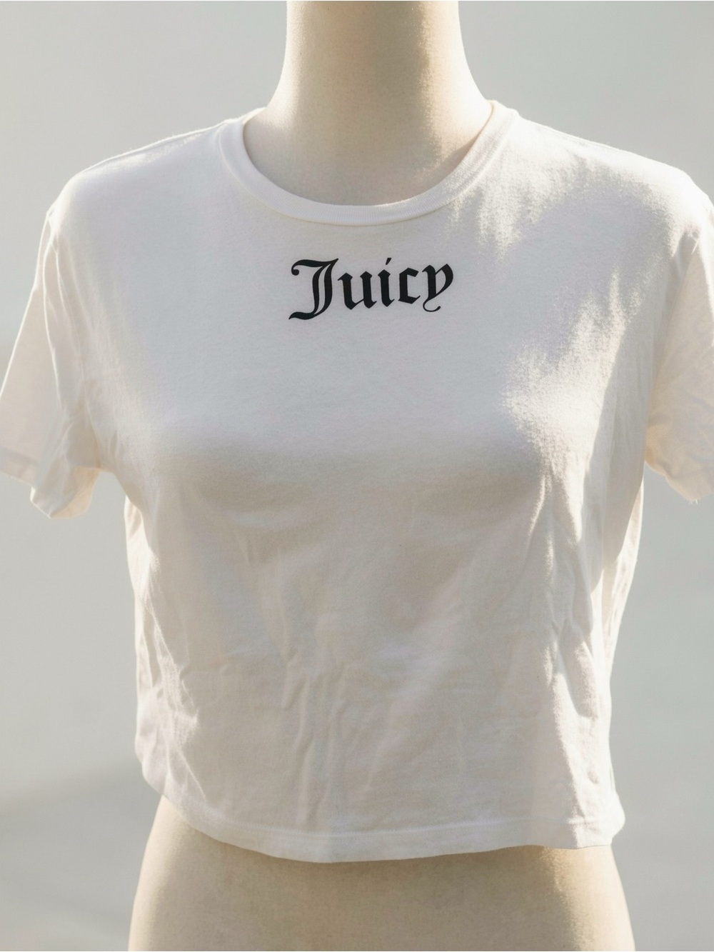 Y2K 2000s style Juicy Couture white tee with black 'Juicy' text